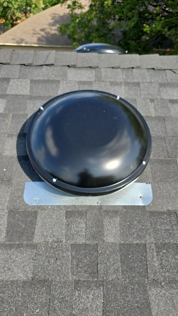 New black GAF Master Flow dome vent on an Owens Corning Duration roof