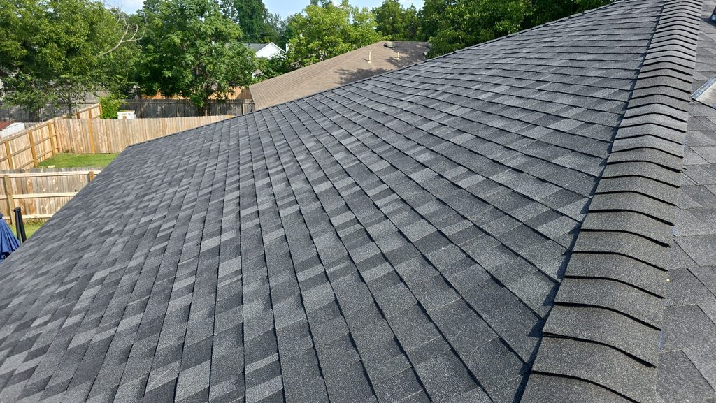 Finished Owens Corning Duration Onyx Black roof with RIZERidge hip and ridge in Northwest Austin