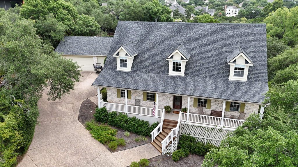 New Owens Corning Duration shingle roof in Estate Gray with three dormers, Lost Creek, Austin 78746
