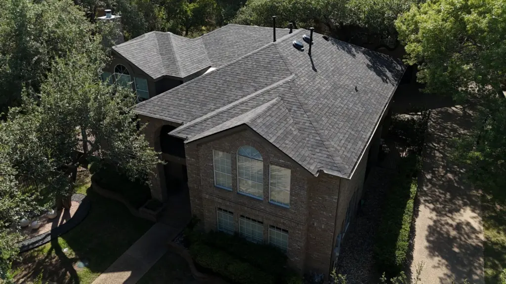 Front aerial view of a completed Owens Corning Black Sable roof replacement in West Lake Hills