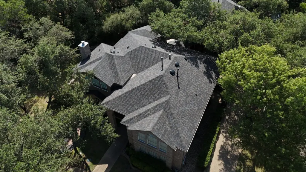 New Black Sable shingle roof with dome vents on a two-story home in West Lake Hills